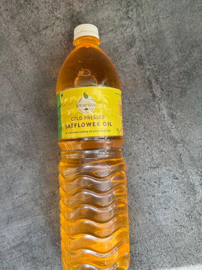 Cold pressed Safflower oil - a product from organic farmers in Karnataka