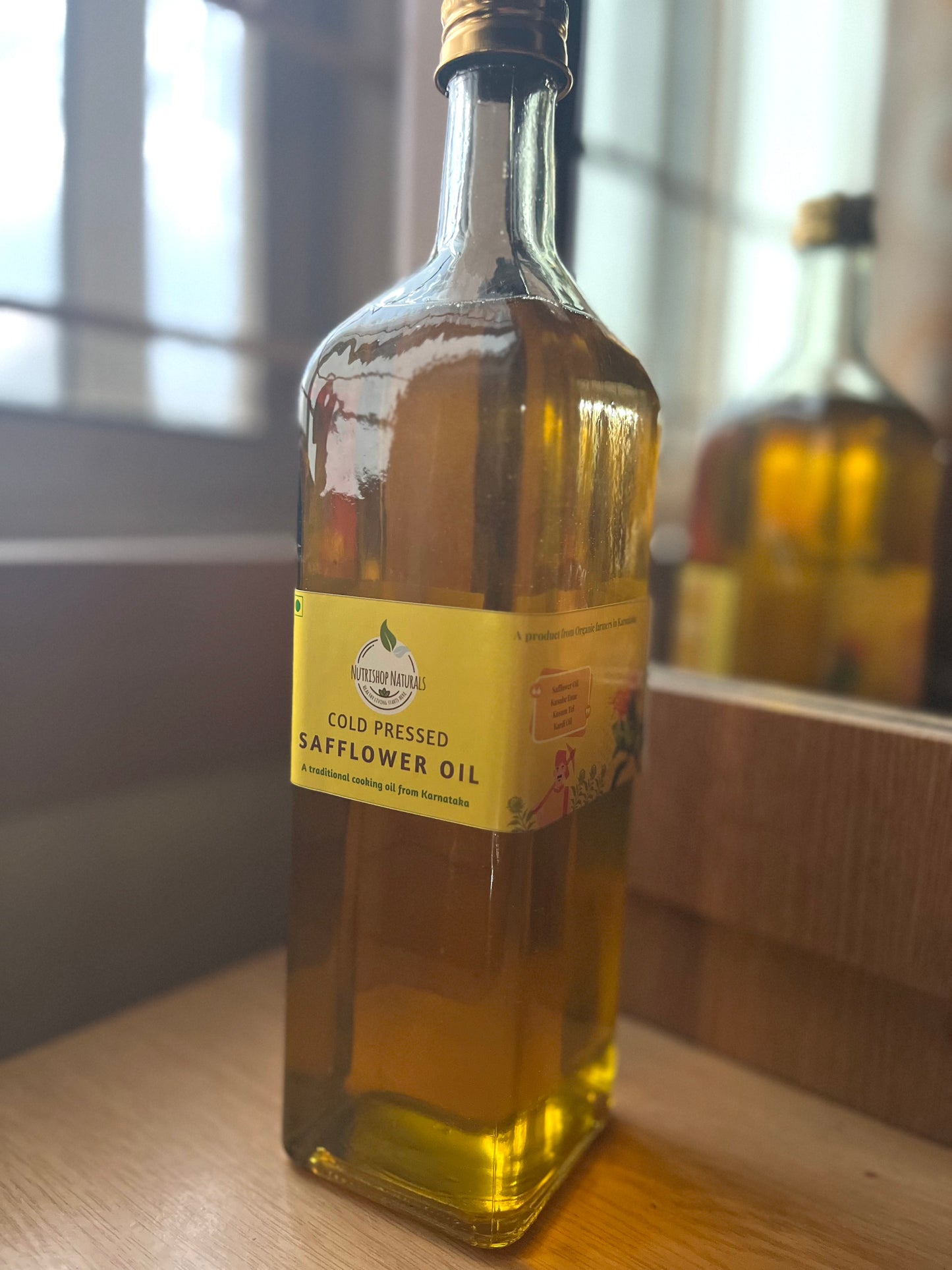 Cold pressed Safflower oil - a product from organic farmers in Karnataka